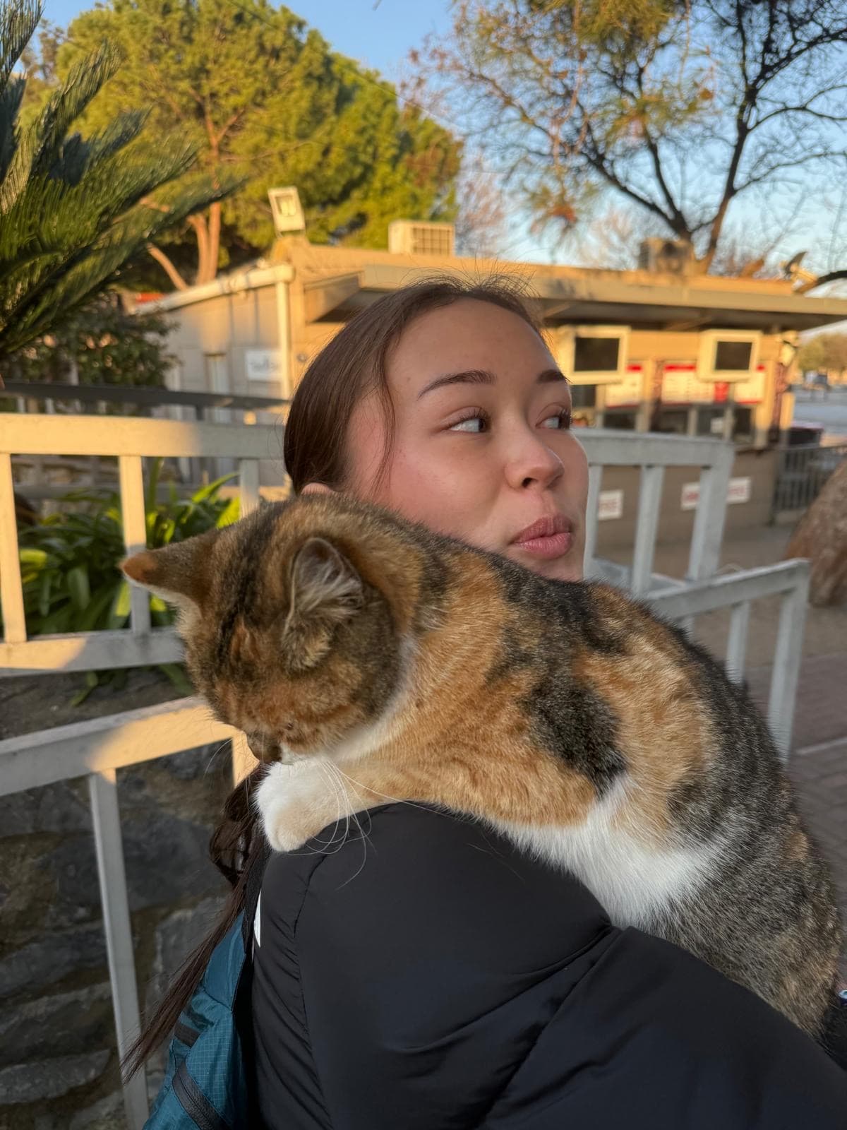 Masha with her calico cat